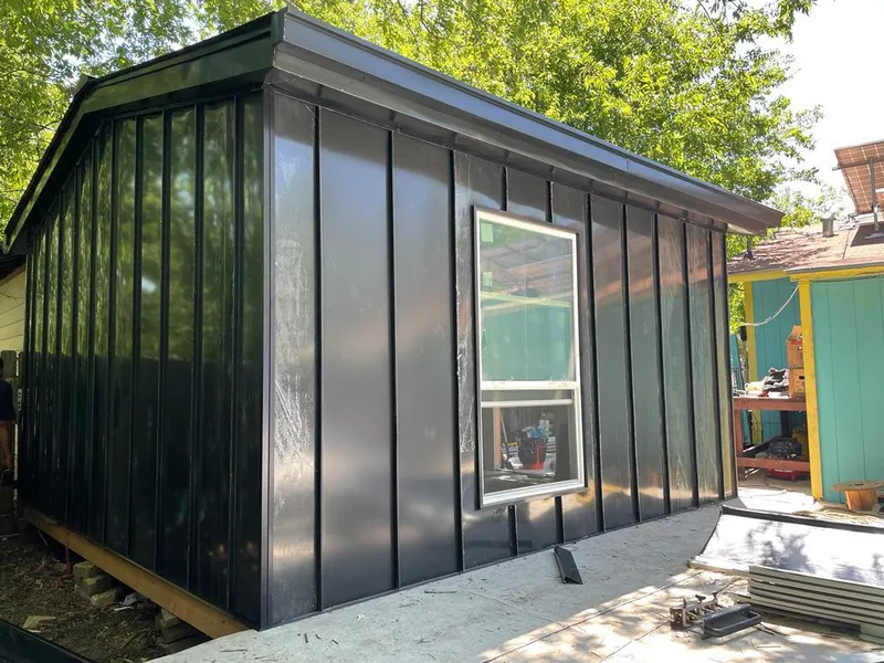 Black standing seam metal wall panels for Roof Inspection in Visalia