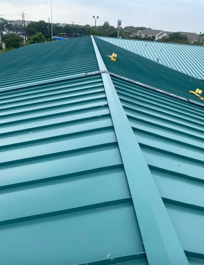 Green commercial metal roof ridge and valley for Metal Roof Repair in Visalia